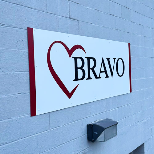 Large ACM panel graphic installed on commercial building exterior