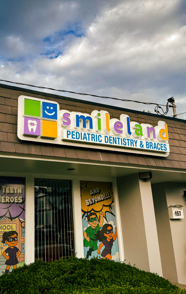 Illuminated channel letters for Smileland Pediatric Dentistry & Braces storefront installed by our sign company