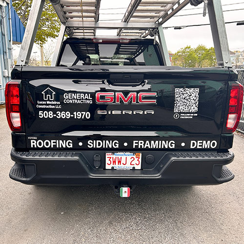 Vehicle Graphics 3 Black contractor truck with custom vinyl graphics