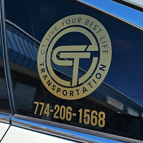 Vehicle Graphics 4 Vehicle window with custom gold vinyl graphics