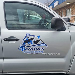 Pickup truck with custom vinyl graphics for business branding