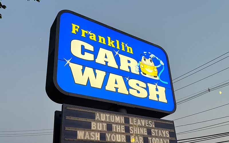 Illuminated Cabinets 1 Car wash illuminated cabinet sign glowing at night